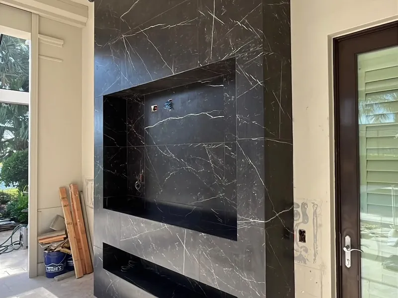 Black marble-look fireplace feature wall